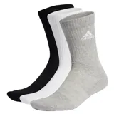 Pack de tres pares de medias Adidas, uno negro, uno blanco y uno gris, con logo de la marca en el tobillo.