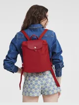 Mochila Longchamp modelo Le Pliage Green, color rojo.