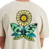 Remera color beige con estampado de un girasol en el pecho.