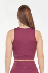 Top deportivo azul marino, sin mangas, con escote redondo y diseño cruzado en el frente.