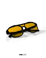 Lentes de sol negros con cristales amarillos polarizados y protección UV400.