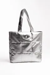 Bolso negro impermeable, con compartimento para tablet o PC de hasta 15.6 pulgadas y bolsa interna con cierre.