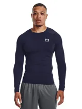 Remera de compresión Under Armour HeatGear® de manga larga, color azul marino, con logo blanco en el pecho.