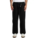 Pantalón negro de tela con cintura elástica y cinturón ajustable.