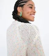 Campera corta de tejido de punto multicolor con mangas abullonadas y puños ajustados.