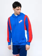 Buzo canguro azul con capucha, mangas rojas y escudo del Club Nacional de Football estampado en el pecho.
