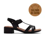 Sandalias de cuero negro Usaflex Sara con taco bajo cuadrado y tiras finas.