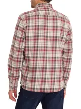 Camisa de franela a cuadros color celeste, naranja y marrón, de manga larga y corte moderno.
