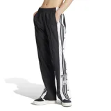 Pantalón Adidas Adibreak negro con tres rayas blancas laterales y botones a presión.