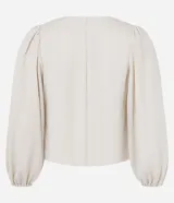 Blusa color beige confeccionada en viscosa, con escote cuadrado, mangas largas abullonadas y puños ajustados.