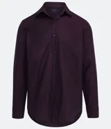 Camisa blanca de algodón, manga larga con botonadura frontal y cuello camisero.