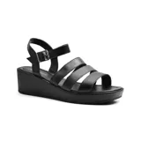 Sandalias de cuero color crudo con plataforma y tiras horizontales.