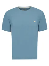 Remera blanca de jersey de algodón 100% orgánico, de manga corta y cuello redondo. Presenta un logo pequeño en el pecho.