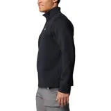 Chaqueta de forro polar Columbia, color negro, con cuello alto y cierre frontal de tres botones. Presenta un panel horizontal en el pecho y el logo de la marca bordado en el lado izquierdo del pecho.