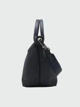 Bolso de viaje Longchamp modelo Le Pliage Xtra, color azul marino, con doble asa corta y correa larga extraíble.