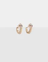 Aros argolla bañados en oro con diseño de serpiente y strass.