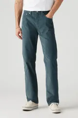 Pantalón de pana azul petróleo de corte recto, con tiro medio y cinco bolsillos.