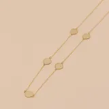 Gargantilla de oro amarillo 9k con cadena fina y dijes circulares satinados.
