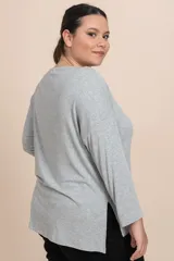Remera manga larga gris melange de tejido de punto canalé.
