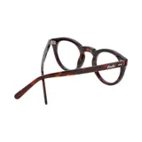 Anteojos de eco acetato con marco carey y forma redonda.