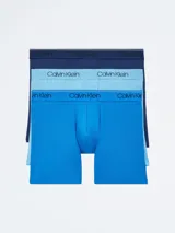 Pack de tres bóxer de microfibra stretch en tonos azul marino, celeste y azul. Todos tienen cintura elástica con el logo de Calvin Klein.