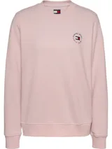 Buzo rosa de algodón con cuello redondo, corte regular y logo de Tommy Jeans en el pecho.