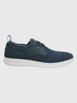 Zapatilla urbana Hush Puppies modelo Port, color tostado, con capellada de cuero y malla, cordones y suela con tecnología ZeroG de EVA.