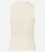 Musculosa negra de algodón con textura acanalada y botones frontales.