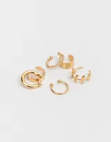 Set de seis cuffs dorados con diferentes diseños.