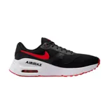 Championes Nike Air Max Systm negros con detalles en rojo y blanco.