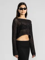 Sweater corto tejido con tres hilos de distintos tonos, uno de ellos con lurex.