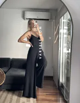 Pantalón palazzo marrón de crepé de lino, talle único adaptable hasta un talle 42 de jean. Presenta elástico en la parte trasera.