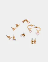Set de seis pares de aros dorados con diferentes diseños: bolita metálica, perla, corazón, moño y strass.