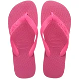 Ojotas Havaianas Top color blanco, con suela texturizada y tiras con diseño en relieve y logo de la marca.