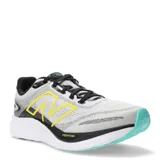 Championes para correr New Balance Fresh Foam 680 V8, color gris con detalles en amarillo y celeste.