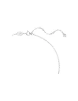 Conjunto de collar y aros Swarovski, modelo Volta, con baño de rodio y cristales transparentes engastados en forma de lazo.