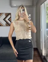 Musculosa de tul color dorado con bordado de canutillo y lentejuelas.