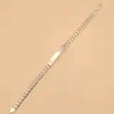 Pulsera de plata 925 con eslabones tipo cadena y placa rectangular para grabar.