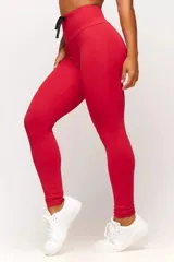 Calza deportiva negra de tiro alto con cordón ajustable en la cintura y logo estampado en la pierna.