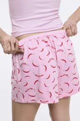 Short blanco con estampado de pequeñas flores rojas, cintura elastizada.