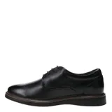 Zapato de vestir de hombre, color negro, estilo derby o blucher, con cordones y capellada de cuero texturizado. Posee una suela gruesa de goma en tonos marrones y negros.