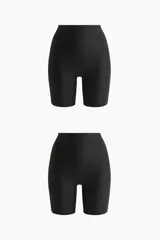 Pack de dos culottes tipo shorts de microfibra negra, con tiro alto y efecto moldeador en cintura, glúteos y caderas. Presentan ribetes cortados por láser para un acabado invisible bajo la ropa.