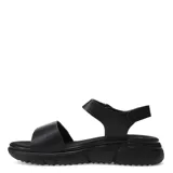 Sandalias beige con plataforma blanca y detalles dorados. Cuentan con dos tiras con perforaciones y ajuste de velcro.