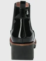 Botín Chelsea de cuero color marrón, con elásticos laterales, suela de goma y taco de 5 cm.