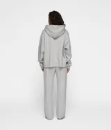 Buzo hoodie gris melange de corte oversize, confeccionado en tejido polar grueso y cepillado. Presenta un gran parche del logotipo de 10DAYS en el frente, capucha, puños acanalados y dobladillo sin rematar.