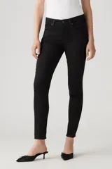 Jeans negros ajustados de tiro alto, con denim stretch y tecnología Hypersoft.