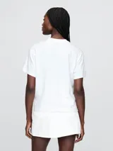 Remera blanca de algodón con estampado de limones y texto "Amalfi Coast" en azul.