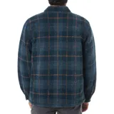 Campera tipo camisa de sherpa azul con diseño a cuadros marrones, cierre frontal con cremallera, cuello clásico y dos bolsillos con solapa abotonada en el pecho.