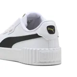 Championes Puma Carina 3.0 de cuero blanco con detalles en negro, suela de plataforma y logo dorado.