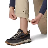 Pantalón largo negro convertible en short, con tecnología Omni-SHADE de protección solar FPU 50, bolsillos laterales y traseros.